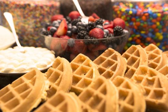 image of waffles and desert toppings 